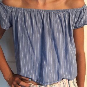 Of the shoulder top blue with white stripes.